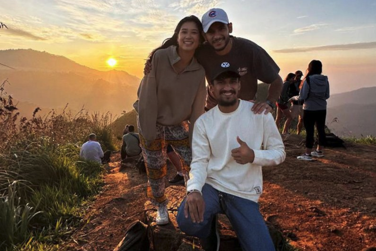 Travellers and driver at a Sri Lanka sunrise viewpoint