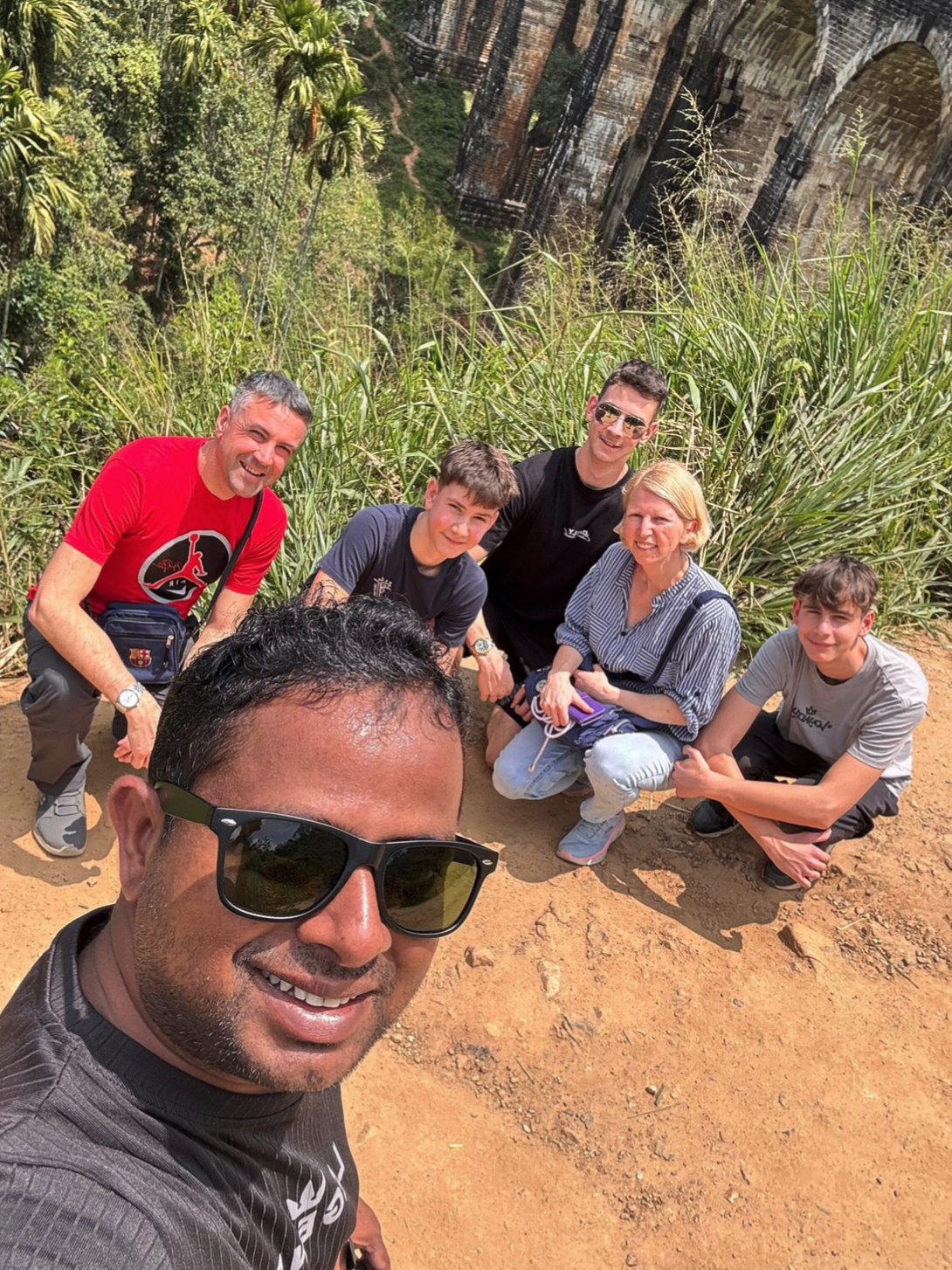 Travellers and private driver near Nine Arch Bridge in Ella Sri Lanka