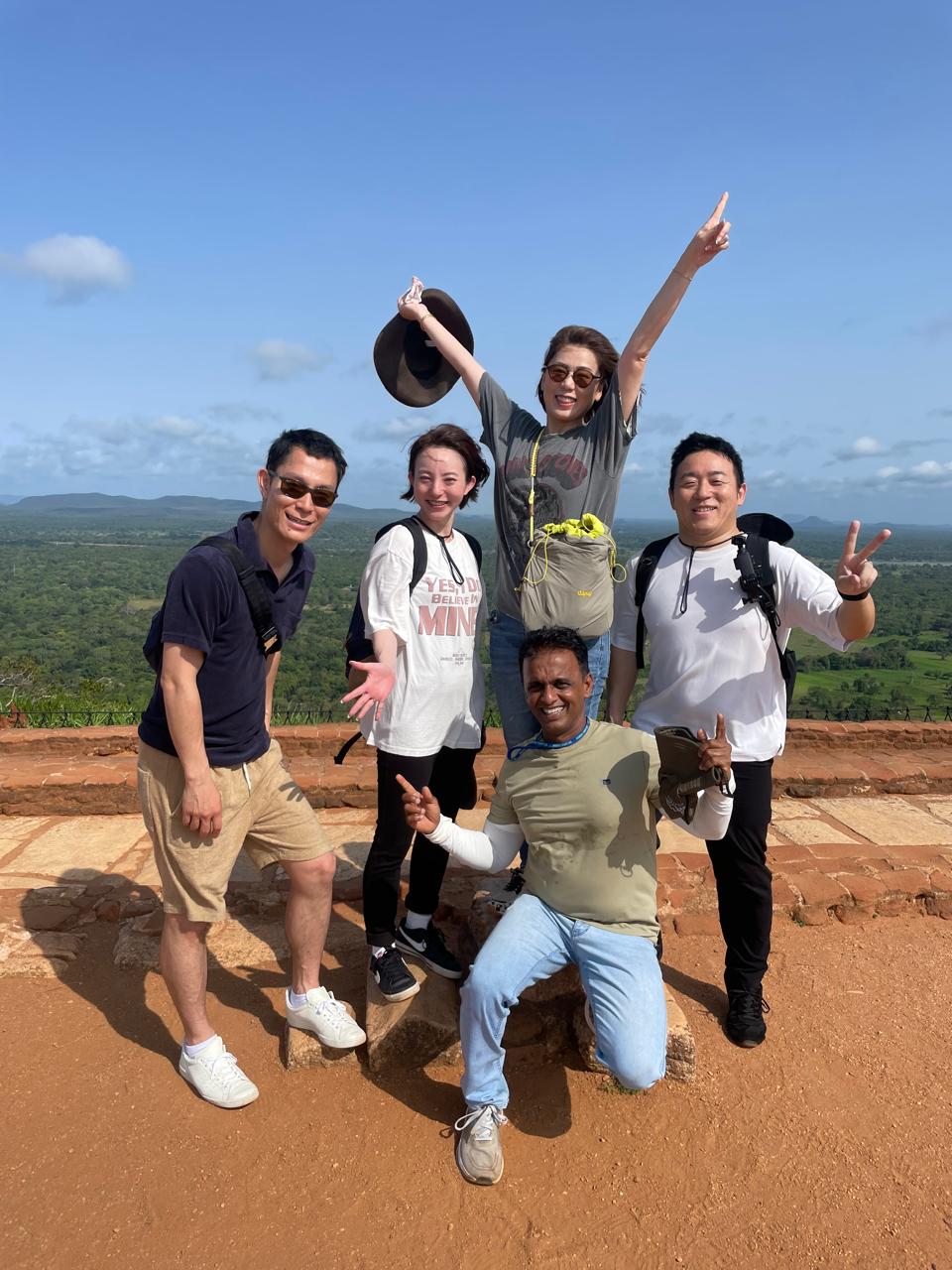 Travellers and private driver at Sigiriya viewpoint in Sri Lanka