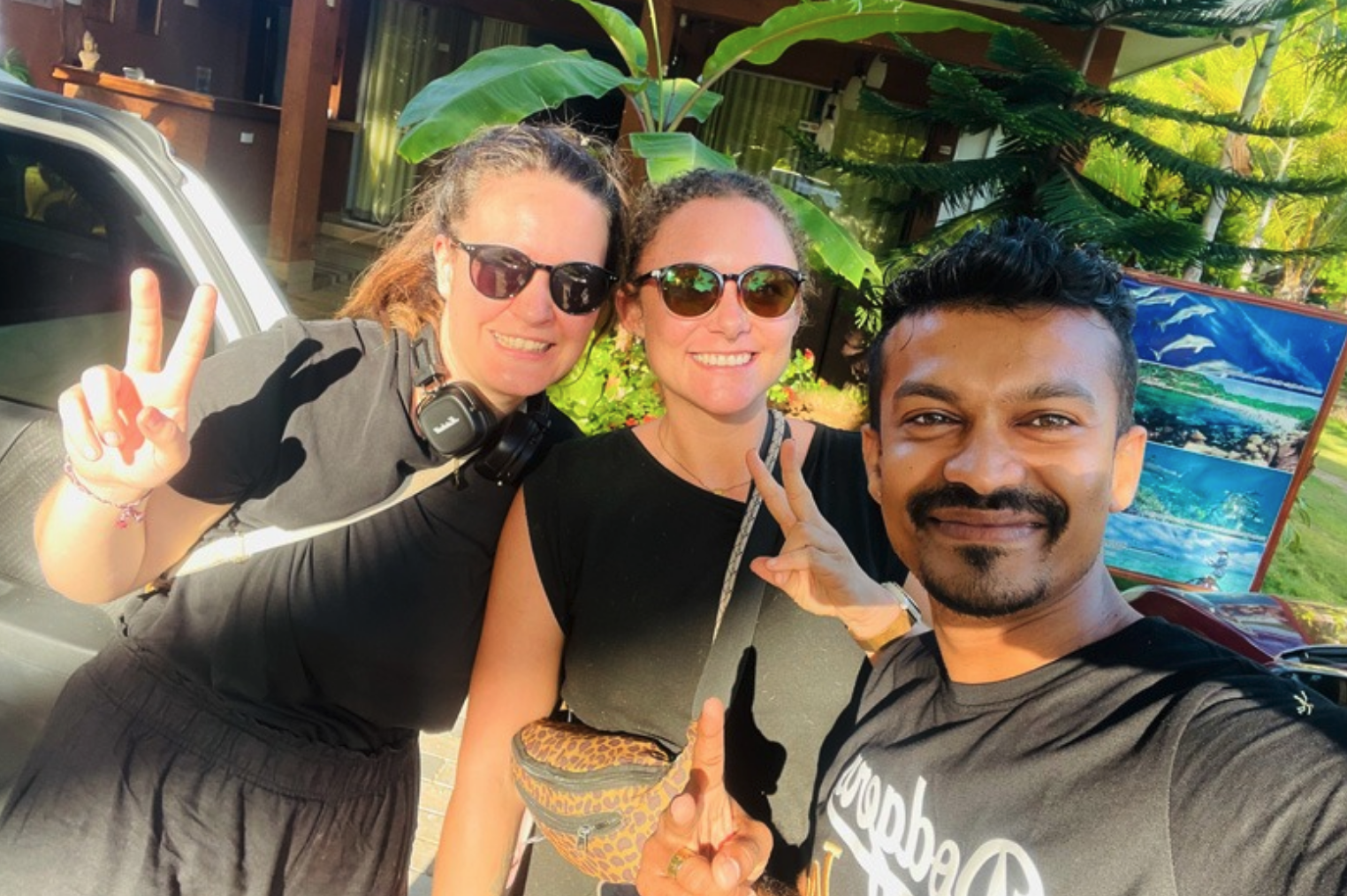 International travellers with their Sri Lankan private driver during a multi-day route