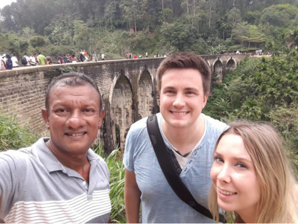 Travellers visiting Nine Arch Bridge with their Sri Lanka driver